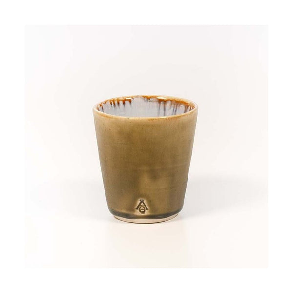 Allison Evans Oyster juice cup in abalone and tortoise glazed finish.