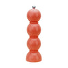 The Bobbin salt and pepper mill is shaped like three balls resting on top of each other. Made of Acacia wood and painted in fun colors and lacquered. This is a picture of a single mill in the color "coral pink."