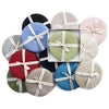 Grouping of assorted colors of Deborah Rhodes round braided coasters.