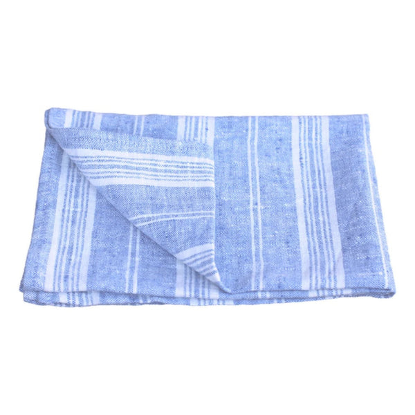 Blue and striped linen hand towel folded on white background. 