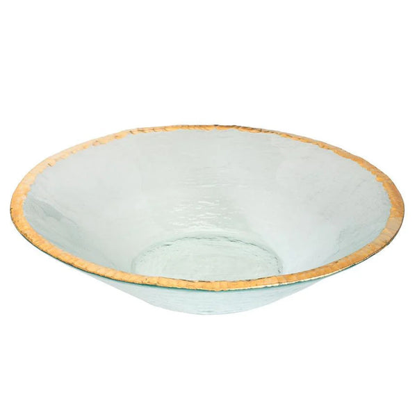 Clear glass bowl with gold rim on a white background
