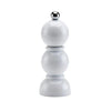 Small white bobbin pepper grinder on white background.