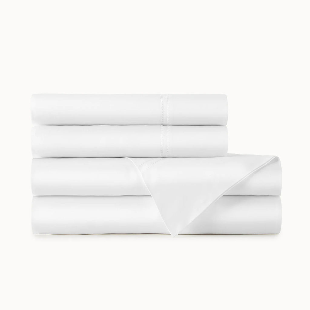Stack of white, lyric, percale sheeting. 