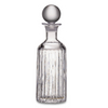 Hand cut glass decanter on white background.