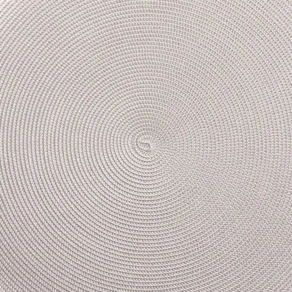 Round woven placemat on a white background