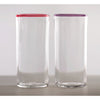 Two clear Lindean Mill tall optic tumblers. with colored rims. One each in red and violet.