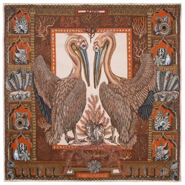 Decorative scarf with pelican design and intricate border of shells.