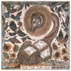 Decorative scarf with a giraffe surrounded by birds and sunflowers, with 'XIX The Sun XIX' text at the bottom.