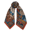 A knotted Sabina Savage scarf, The Wind Horse" in the color, Madder & Sky.