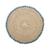 Natural fiber placemat with aqua border on white background.