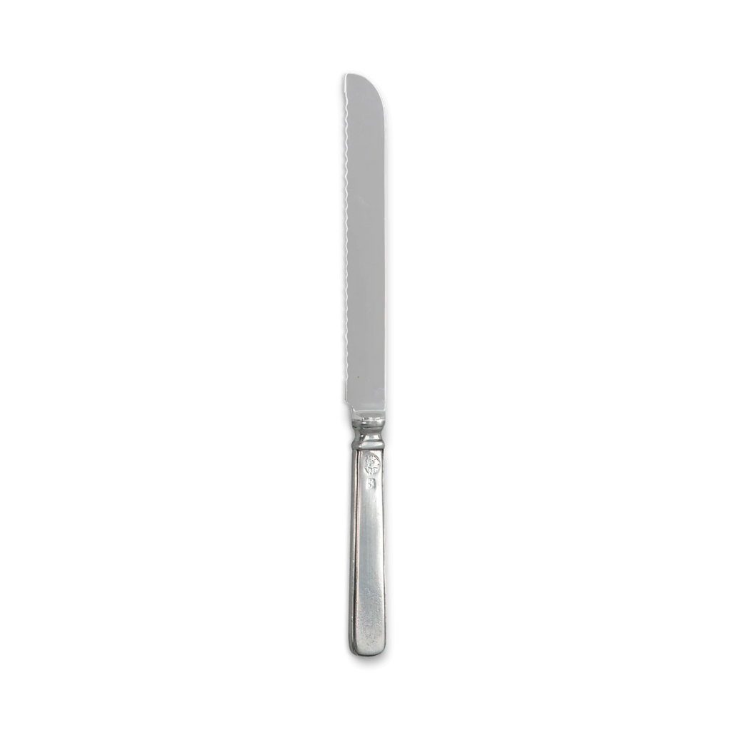 Serrated pewter and stainless bread knife on white background.