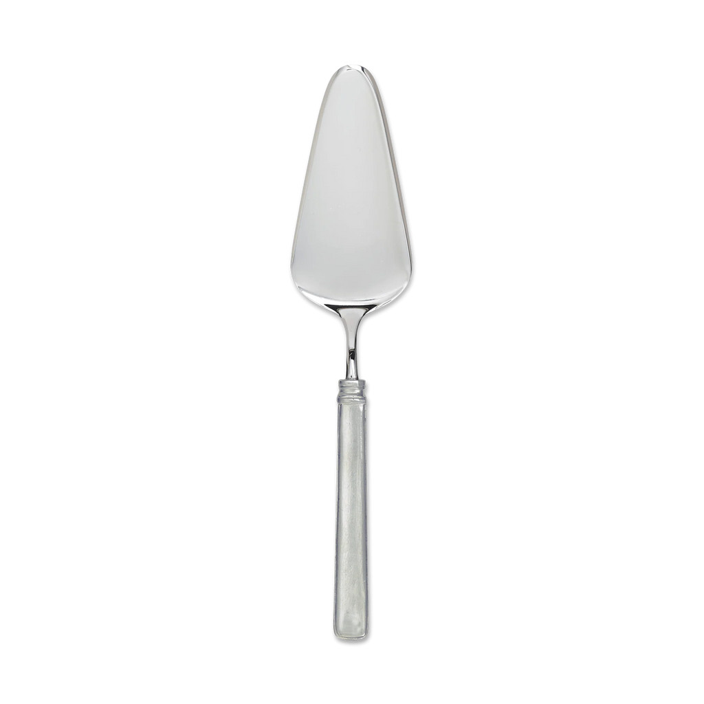 Pewter and stainless cake server on white background.
