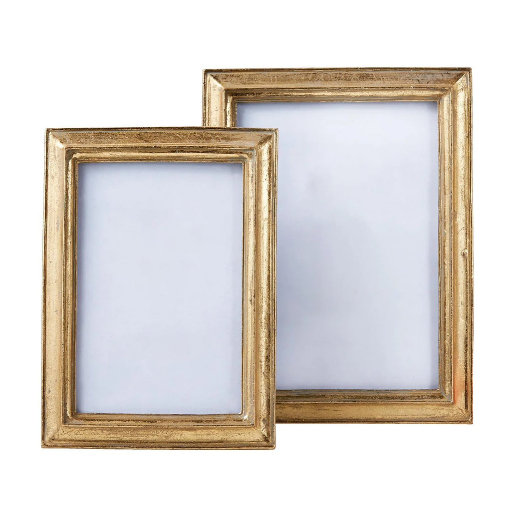 Two Chatelet gold photo frames stand vertically. One measures 4"x6" and one measures 5"x7."