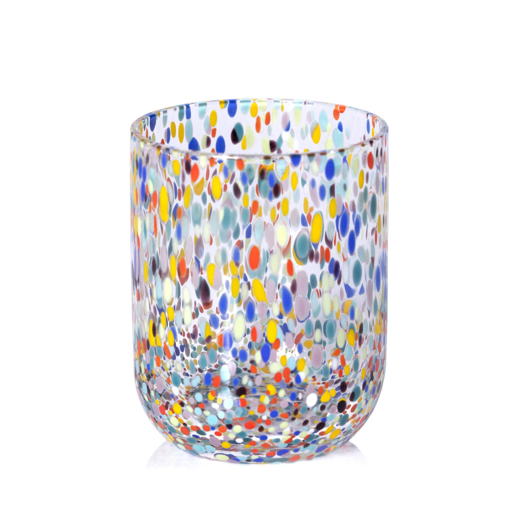 Confetti glass tumbler on white background.