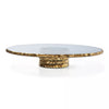 Round glasscake stand with gold  edges and gold base on a white background