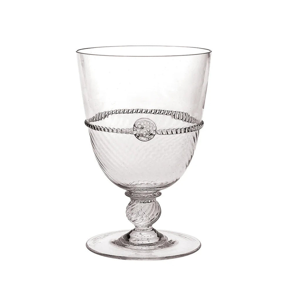 Clear glass goblet with decorative base on a white background