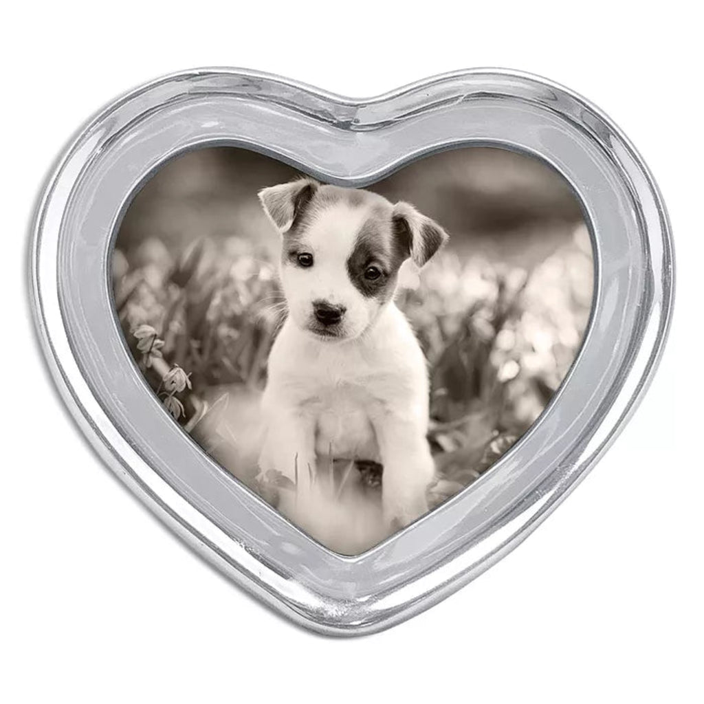 Aluminum heart frame with image of dog on white background.