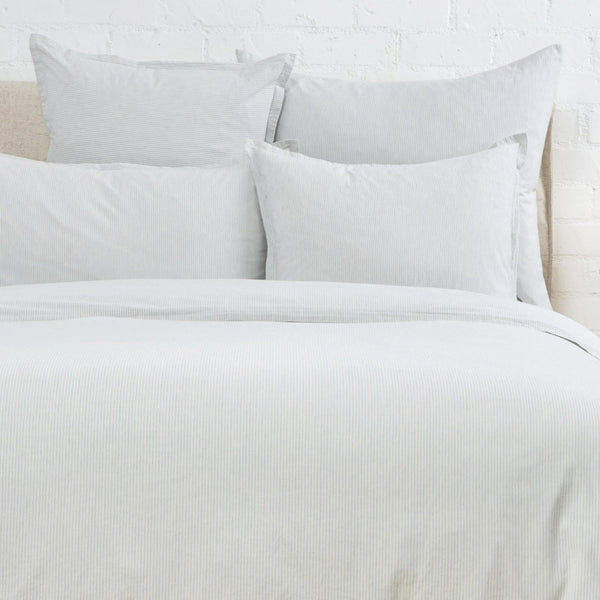 Blue and white striped bed duvet and pillo