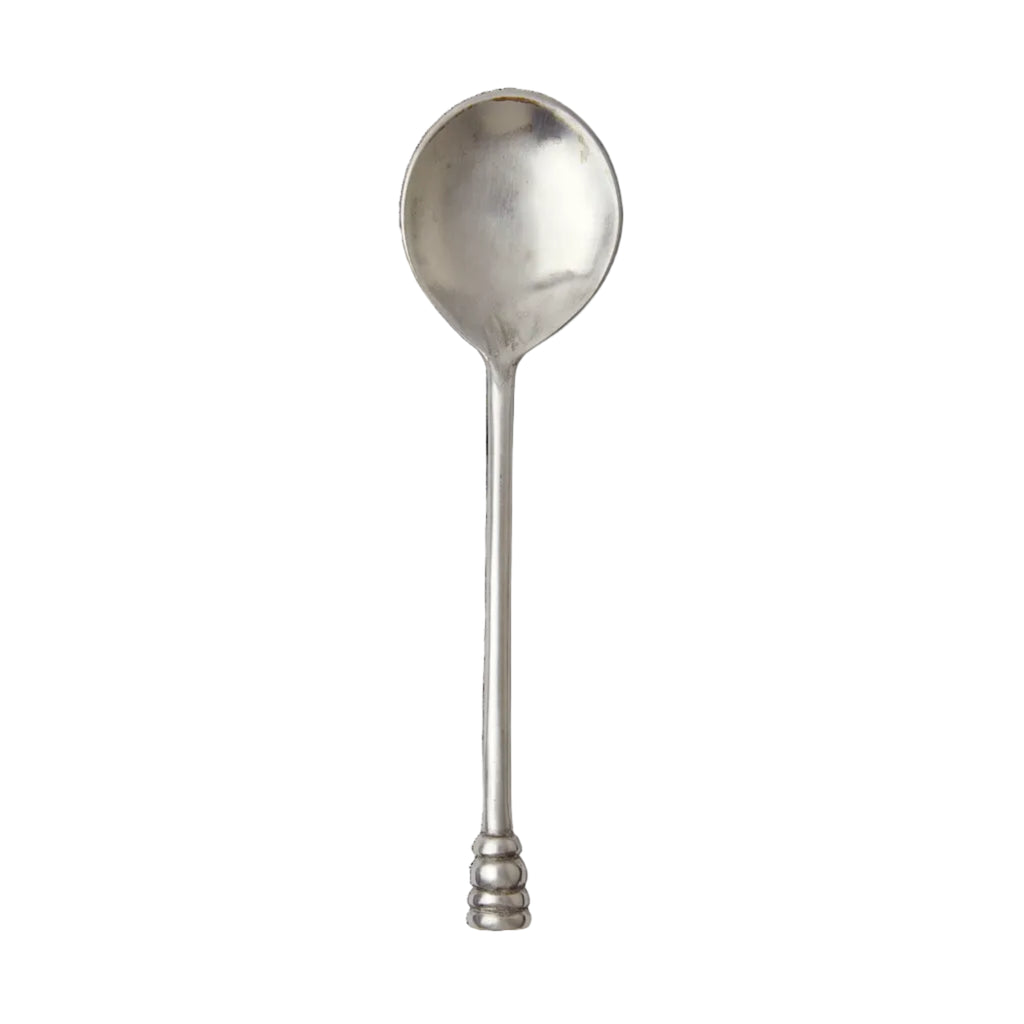 Luna pewter spoon on white background.