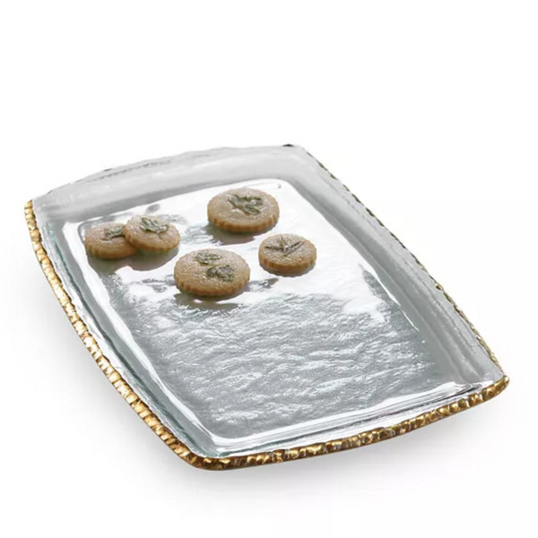 GLass tray with gold rim on a white background