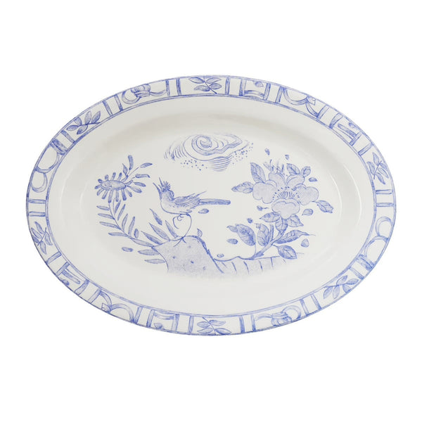 Blue and white oiseau pattern platter on white background. 