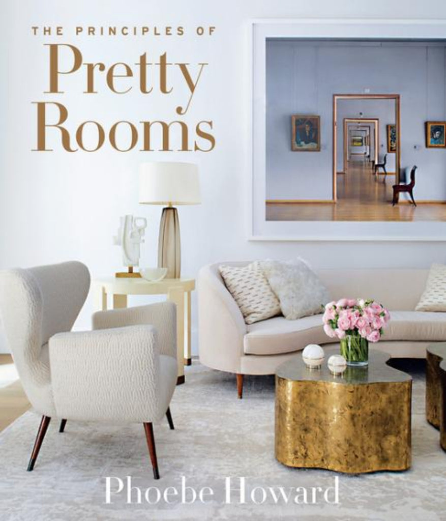 Book cover of 'The Principles of Pretty Rooms' by Phoebe Howard with a modern living room interior.