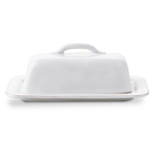 White ceramic Puro butterdish on white background.