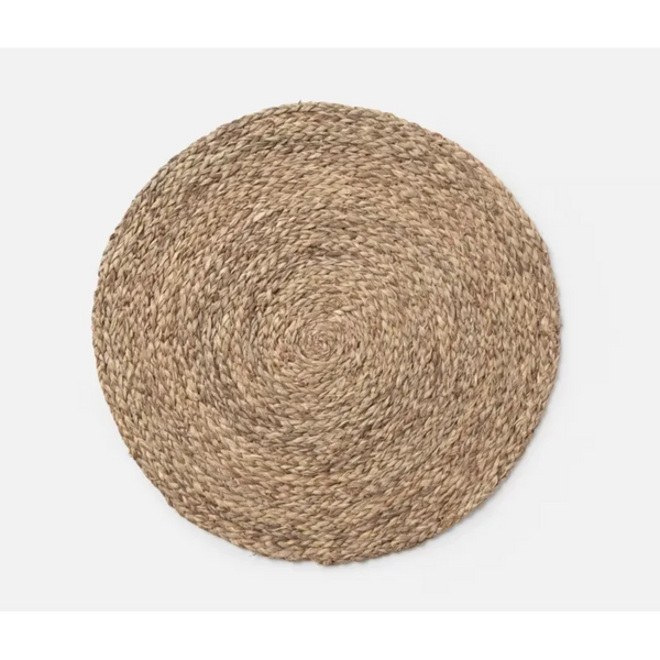 Round woven mat on a white background