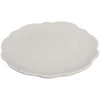 Melamine scalloped salad plate in stone on white background.