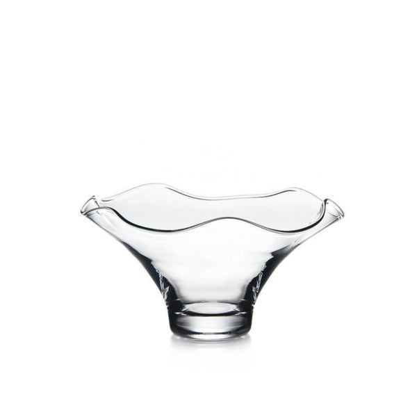 Medium Simon Pearce Chelsea bowl made of clear hand-blown glass with a narrow base and a wide wavy rim.