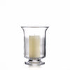 One large Simon Pearce Revere Hurricane with the included pillar candle inside. These clear glass candleholders are 9.5 inches tall and 6.25 inches wide and have a sturdy flared base and flared top.