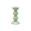 One small green colored bobbin shaped candlestick.