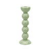 One tall green colored bobbin shaped candlestick.