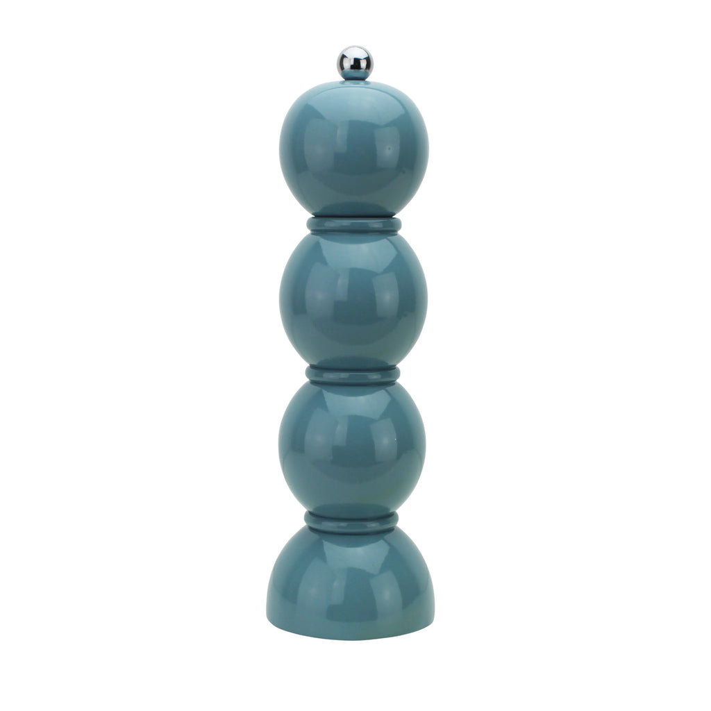 The Bobbin salt and pepper mill is shaped like three balls resting on top of each other. Made of Acacia wood and painted in fun colors and lacquered. This is a picture of a single mill in the color "chambray blue."