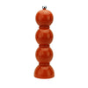 The Bobbin salt and pepper mill is shaped like three balls resting on top of each other. Made of Acacia wood and painted in fun colors and lacquered. This is a picture of a single mill in the color "orange."