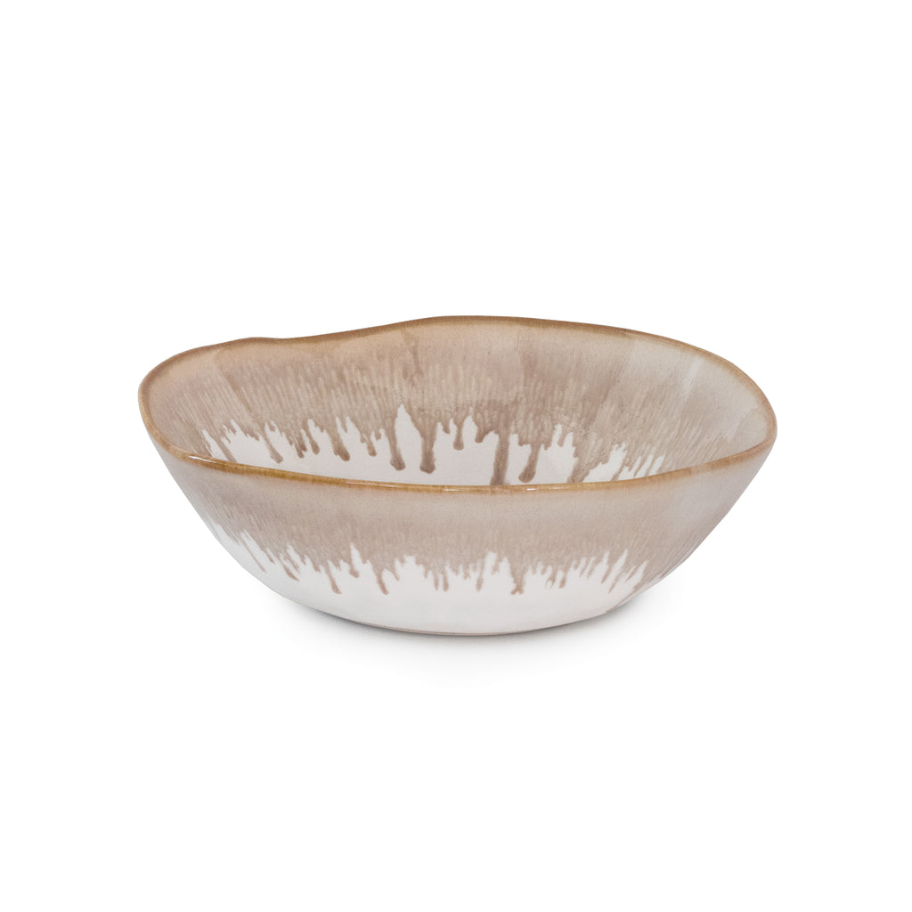Simon Pearce Burlington Bluff cereal bowl has a white ground with a neutral beige dripped effect border. 