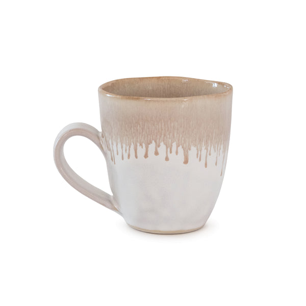 Simon Pearce Burlington Bluff mug has a white ground with a neutral beige dripped effect border. 