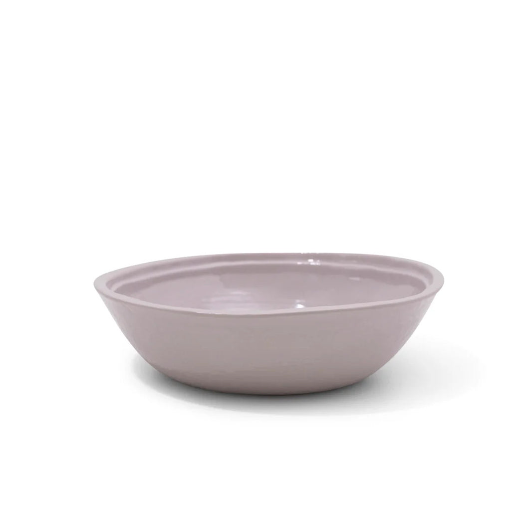 Side view of Relish melamine double lined cereal bowl in stone color.