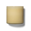 Lafco's Camomile Lavender candle is housed in a hand-blown yellowish-tan glass vessel.